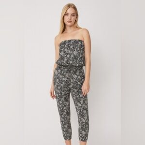 Aritzia - Talula - Tabata Jumpsuit in a black/white floral print. Small